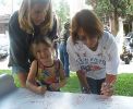 Young Girl Signing