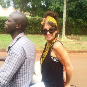 Maryann from Star 92.7 taking a boda ride in Uganda!